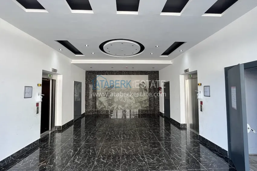 Апартаменты 1+1 с мебелью и техникой, частично вид на море в районе Мезитли-Мерсин 18 