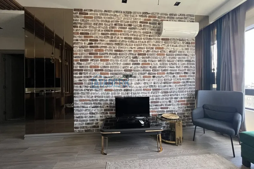 Приобрести Апартаменты 1+1 с мебелью и техникой, частично вид на море в районе Мезитли-Мерсин 4 