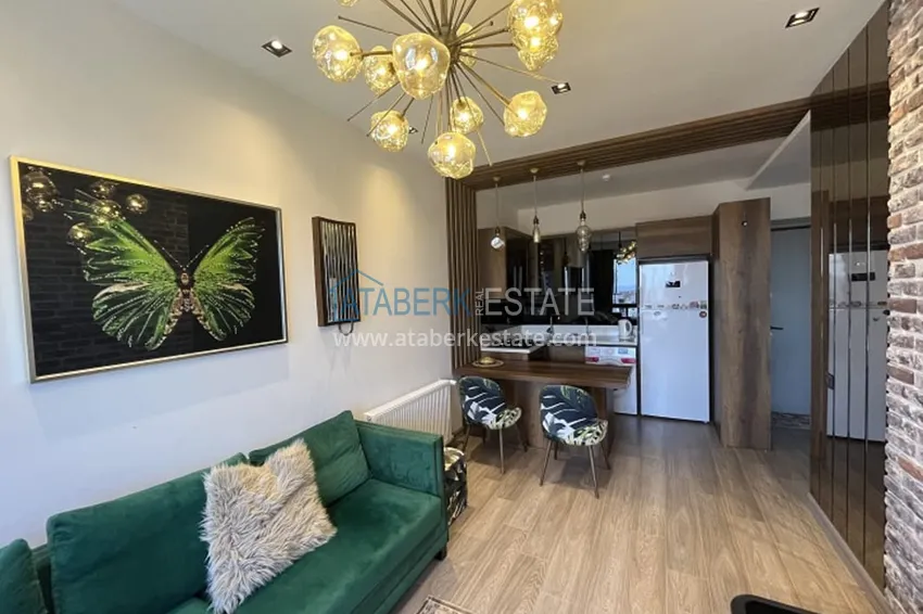 Приобрести Апартаменты 1+1 с мебелью и техникой, частично вид на море в районе Мезитли-Мерсин 6 