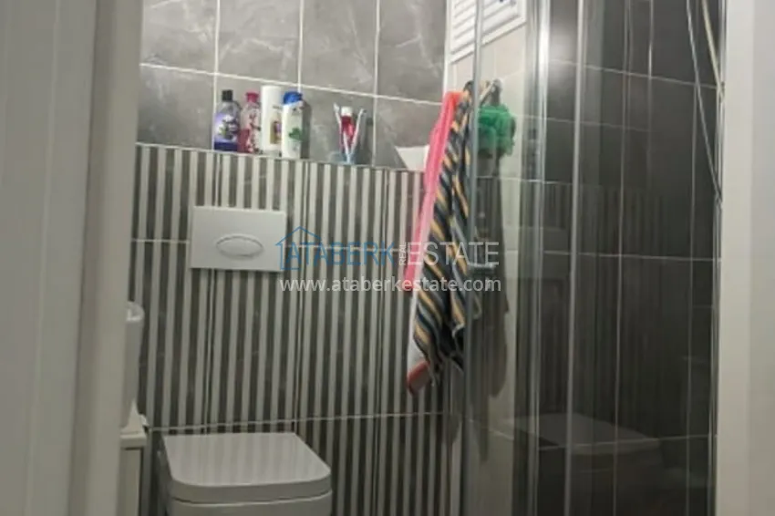 Приобрести Квартира 2+1 в жилом комплексе с инфраструктурой комфорт-класса в 100 метрах от Средиземного моря в районе Томюк-Мерсин 12 