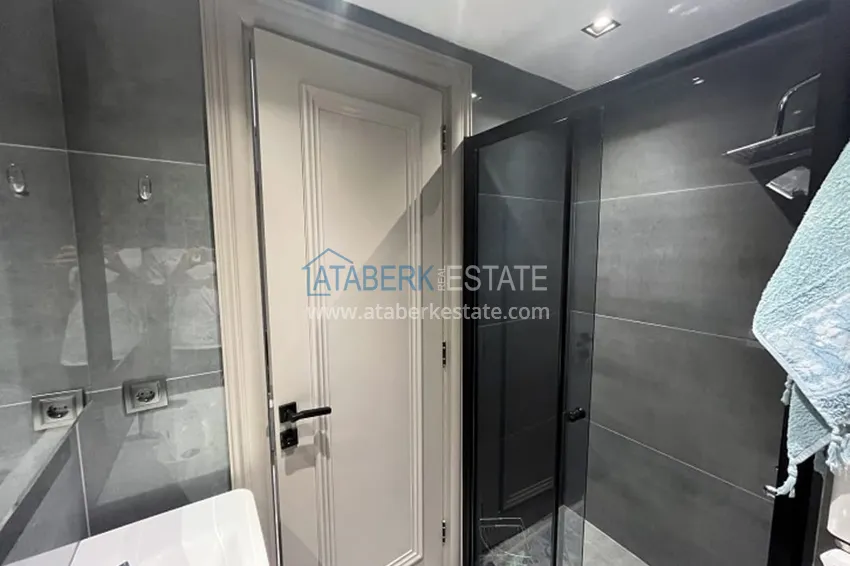 Приобрести Апартаменты 1+1 с мебелью и техникой, частично вид на море в районе Мезитли-Мерсин 27 