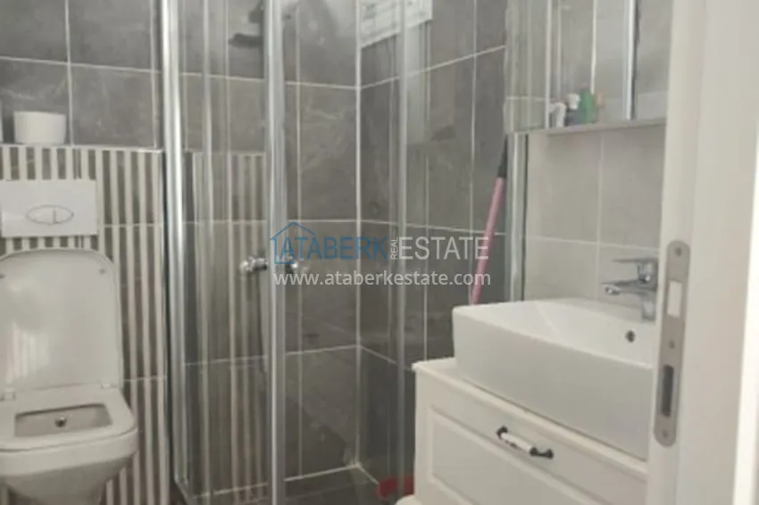 Приобрести Квартира 2+1 в жилом комплексе с инфраструктурой комфорт-класса в 100 метрах от Средиземного моря в районе Томюк-Мерсин 13 