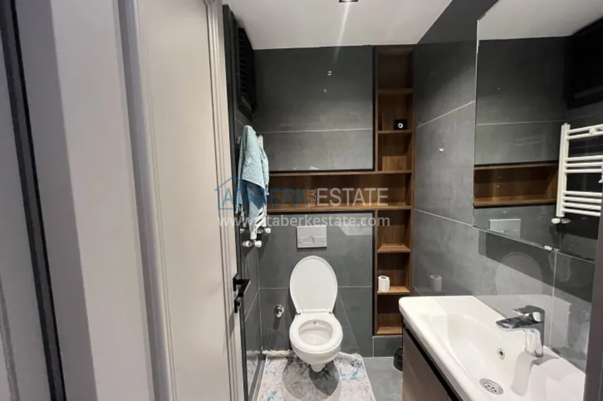 Приобрести Апартаменты 1+1 с мебелью и техникой, частично вид на море в районе Мезитли-Мерсин 28 