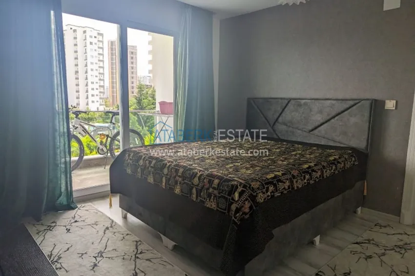 Приобрести Квартира 2+1 в жилом комплексе с инфраструктурой комфорт-класса в 100 метрах от Средиземного моря в районе Томюк-Мерсин 3 