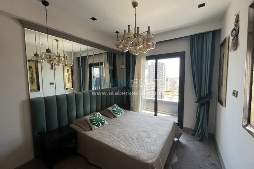 Приобрести Апартаменты 1+1 с мебелью и техникой, частично вид на море в районе Мезитли-Мерсин 9 