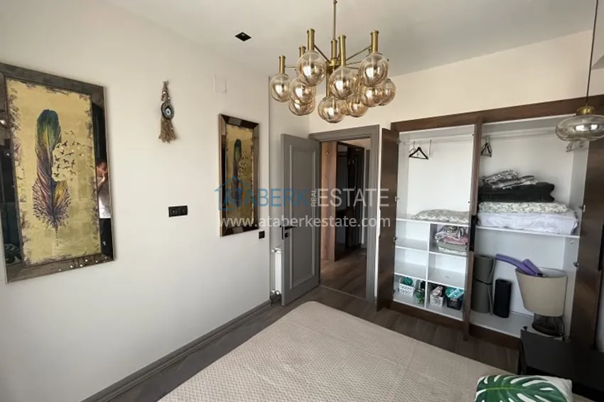 Приобрести Апартаменты 1+1 с мебелью и техникой, частично вид на море в районе Мезитли-Мерсин 10 