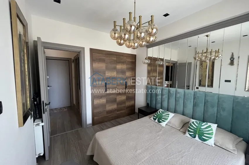 Приобрести Апартаменты 1+1 с мебелью и техникой, частично вид на море в районе Мезитли-Мерсин 12 