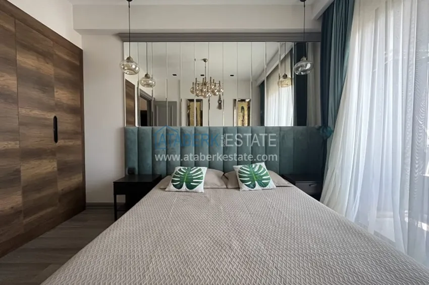 Приобрести Апартаменты 1+1 с мебелью и техникой, частично вид на море в районе Мезитли-Мерсин 13 