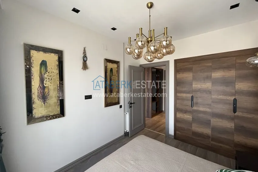 Приобрести Апартаменты 1+1 с мебелью и техникой, частично вид на море в районе Мезитли-Мерсин 14 