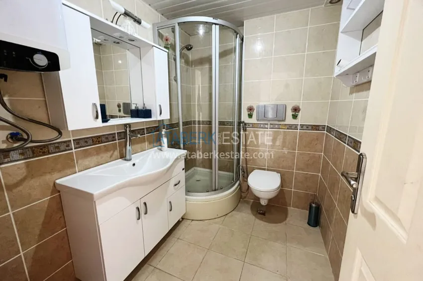 Приобрести Видовой садовый дуплекс 3+1 с мебелью в Алании, район Тепе в клубном комплексе таунхаусов 24 