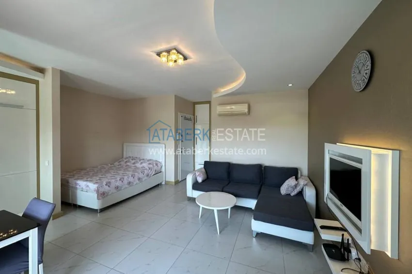 Приобрести Квартира-студия, меблированная с видом на замок, центр Алании - район пляжа Клеопатра 2 