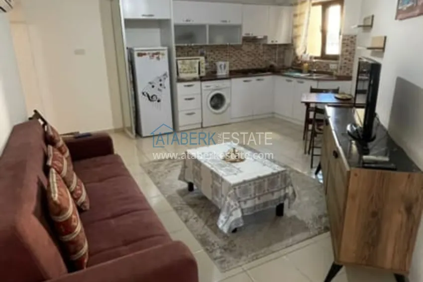 Приобрести Квартира 1+1 меблированная в жилом комплексе с инфраструктурой, район Махмутлар – Алания  3 