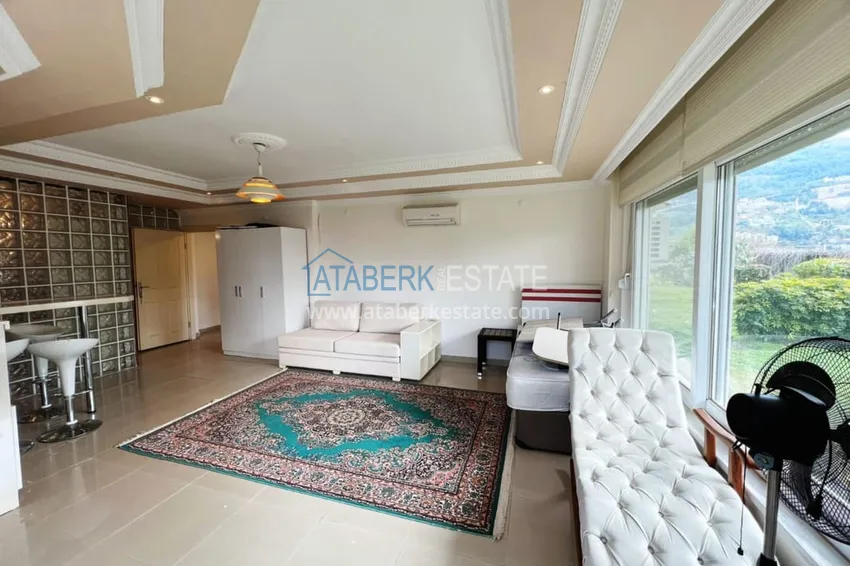 Приобрести Видовой садовый дуплекс 3+1 с мебелью в Алании, район Тепе в клубном комплексе таунхаусов 16 