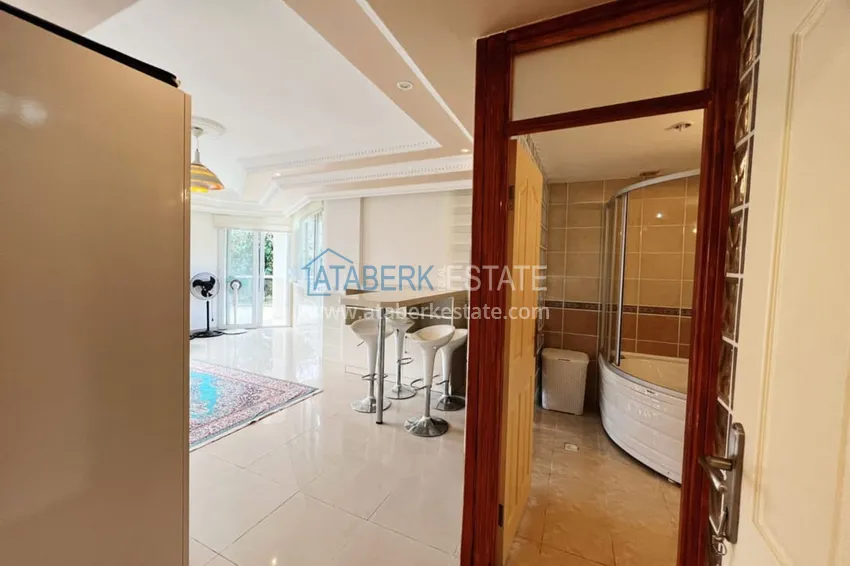 Приобрести Видовой садовый дуплекс 3+1 с мебелью в Алании, район Тепе в клубном комплексе таунхаусов 17 