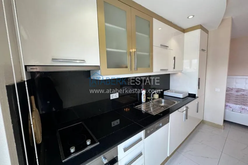 Приобрести Квартира-студия, меблированная с видом на замок, центр Алании - район пляжа Клеопатра 5 