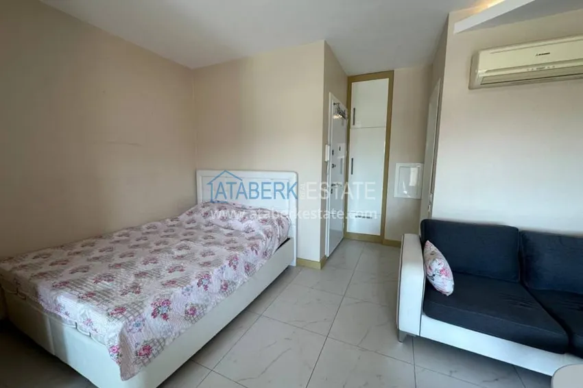 Приобрести Квартира-студия, меблированная с видом на замок, центр Алании - район пляжа Клеопатра 6 