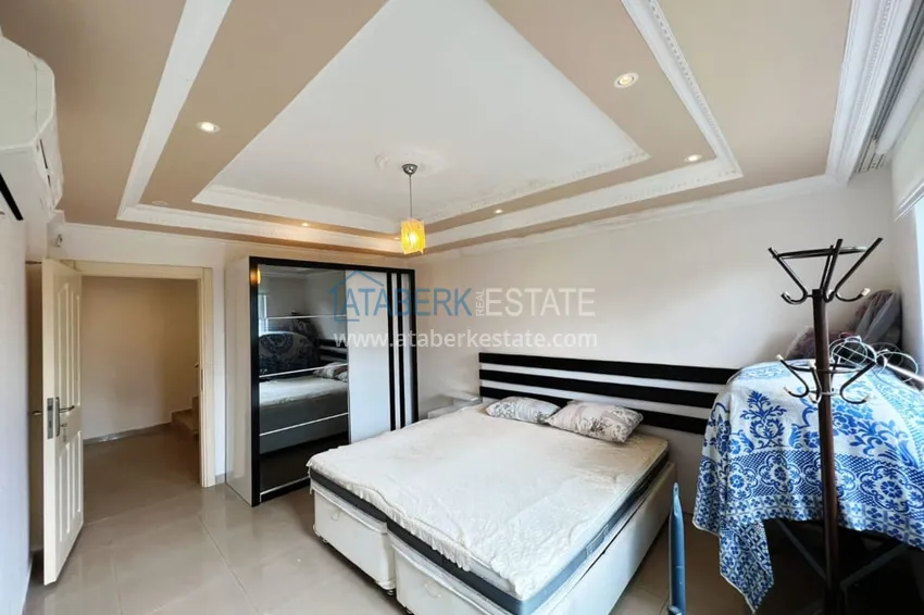 Приобрести Видовой садовый дуплекс 3+1 с мебелью в Алании, район Тепе в клубном комплексе таунхаусов 19 