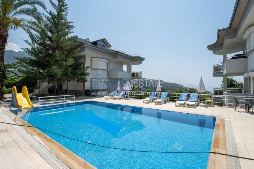 Видовой садовый дуплекс 3+1 с мебелью в Алании, район Тепе в клубном комплексе таунхаусов 20 