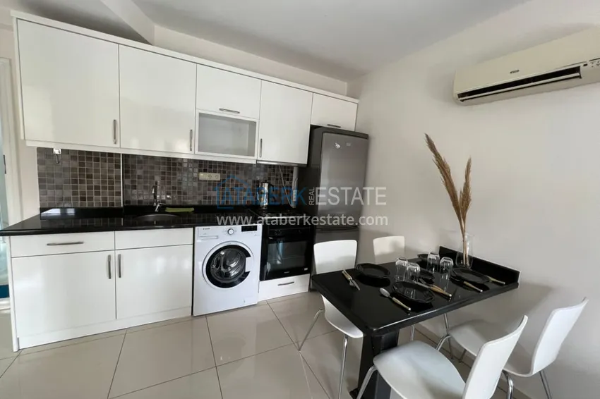 Приобрести Квартира 1+1 меблированная всего в 200 метрах от берега моря, район Оба – Алания 10 