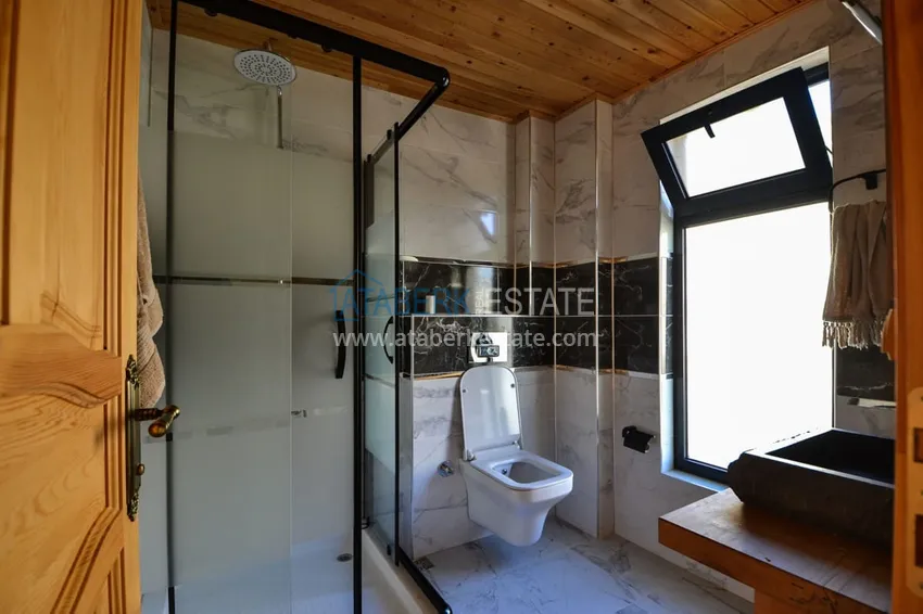 Приобрести Современная частная двухэтажная вилла с новой мебелью и роскошным панорамным видом в Газипаше  10 