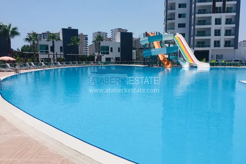 Квартира 2+1 в жилом комплексе с инфраструктурой комфорт-класса в 100 метрах от Средиземного моря в районе Томюк-Мерсин 9 