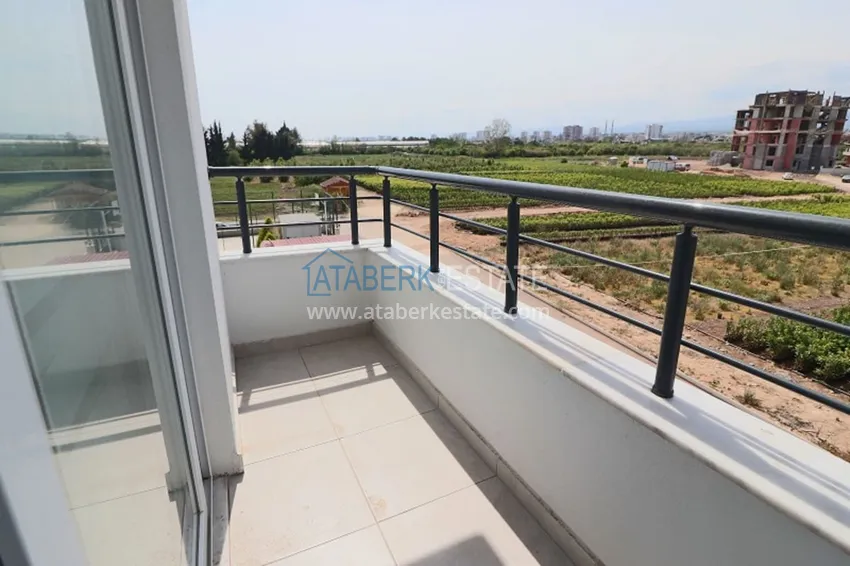 Приобрести Квартира 2+1 с мебелью и техникой в молодом комплексе в районе Тедже-Мерсин 13 