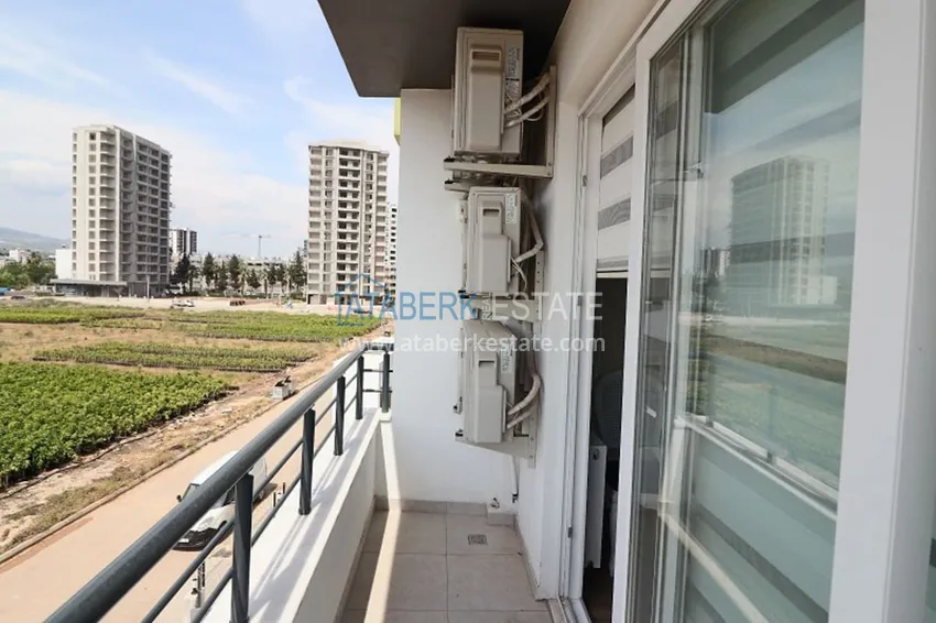 Приобрести Квартира 2+1 с мебелью и техникой в молодом комплексе в районе Тедже-Мерсин 14 