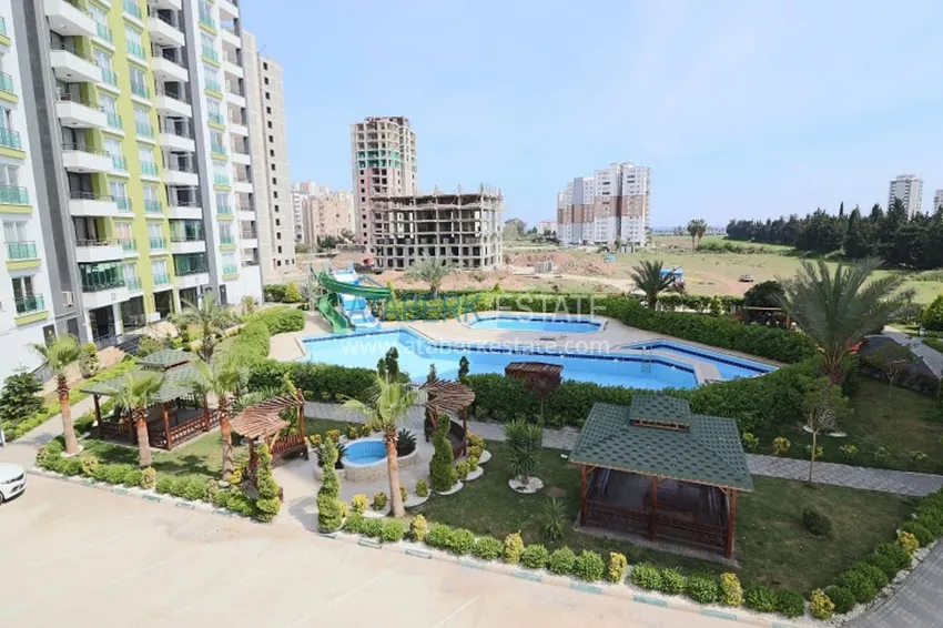 Квартира 2+1 с мебелью и техникой в молодом комплексе в районе Тедже-Мерсин 3 