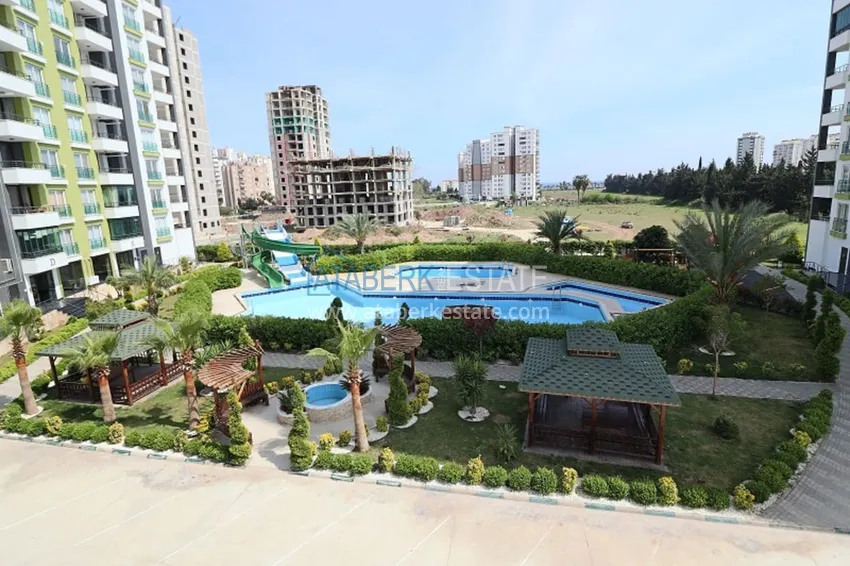 Квартира 2+1 с мебелью и техникой в молодом комплексе в районе Тедже-Мерсин 4 