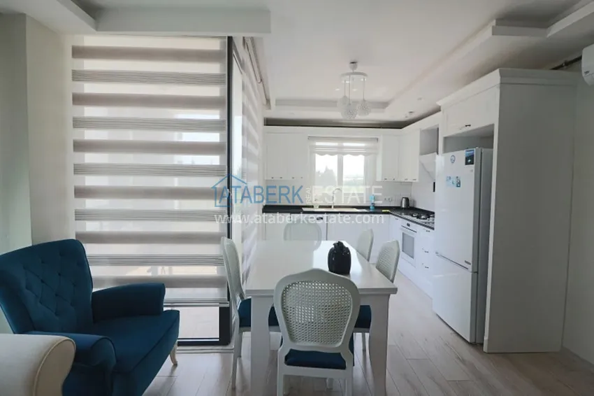 Приобрести Квартира 2+1 с мебелью и техникой в молодом комплексе в районе Тедже-Мерсин 7 