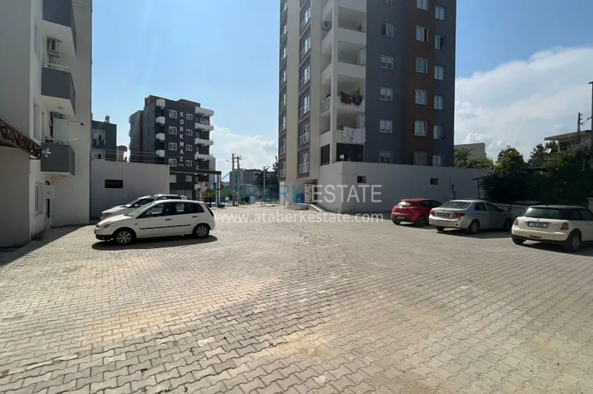Квартира 2+1 с отдельной кухней в 500 метрах от моря в районе Давултепе-Мерсин 10 