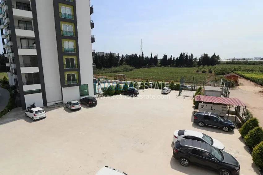 Квартира 2+1 с мебелью и техникой в молодом комплексе в районе Тедже-Мерсин 5 