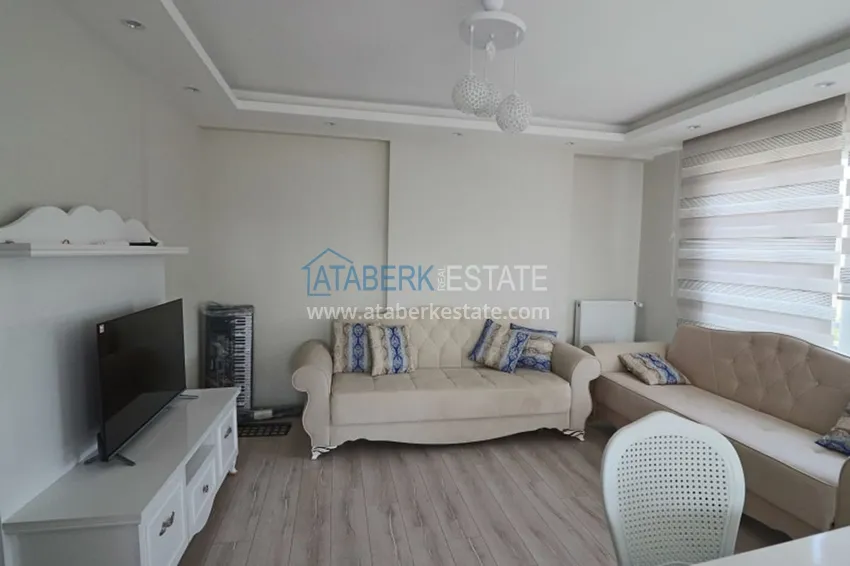 Приобрести Квартира 2+1 с мебелью и техникой в молодом комплексе в районе Тедже-Мерсин 1 