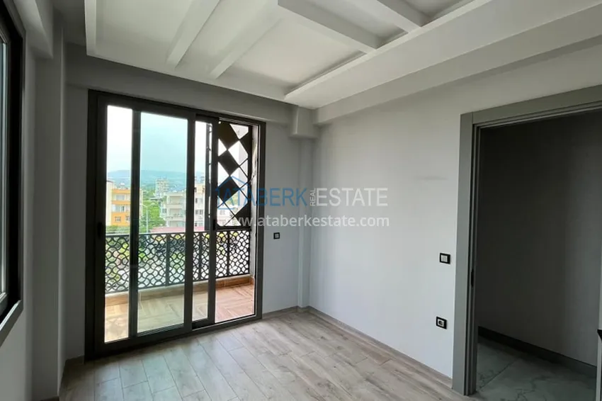 Приобрести Апартаменты 3+1 в жилом комплексе с инфраструктурой в районе Мезитли-Мерсин 5