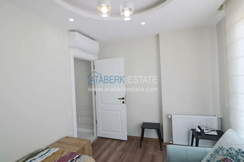 Приобрести Квартира 2+1 с мебелью и техникой в молодом комплексе в районе Тедже-Мерсин 3 