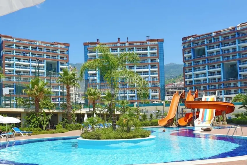 Недвижимость под гражданство и ВНЖ. Квартира 3+1 с мебелью и отдельной кухней в престижном жилом комплексе - район Джикджилли, Алания 1