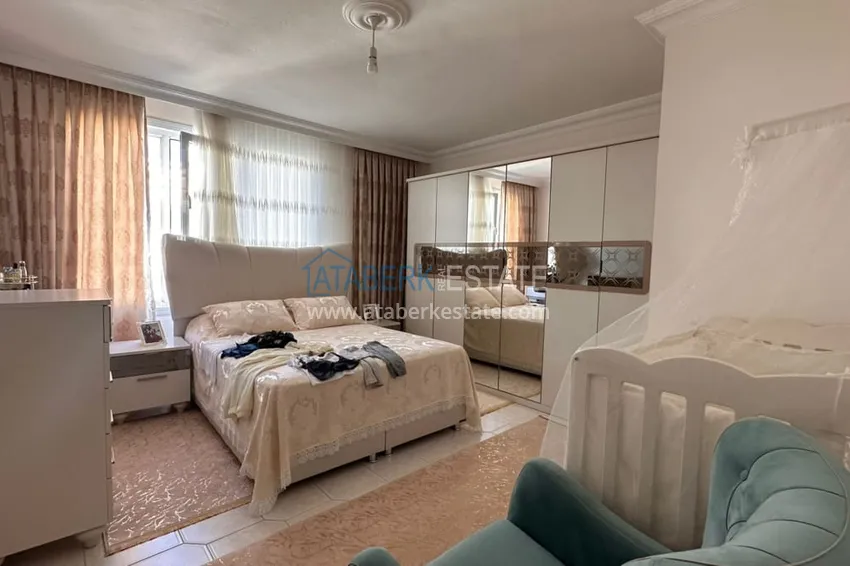 Приобрести Трехкомнатная квартира с открытым видом на горы и море в центре Алании 8 