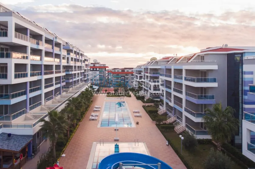 Дуплекс 4+1 с выходом в сад в Кестеле меблированный в элитной резиденции 10 