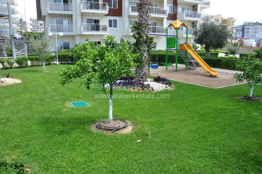 Квартира 1+1 меблированная с застеклённым балконом и видом на море, район Авсаллар – Алания 12 