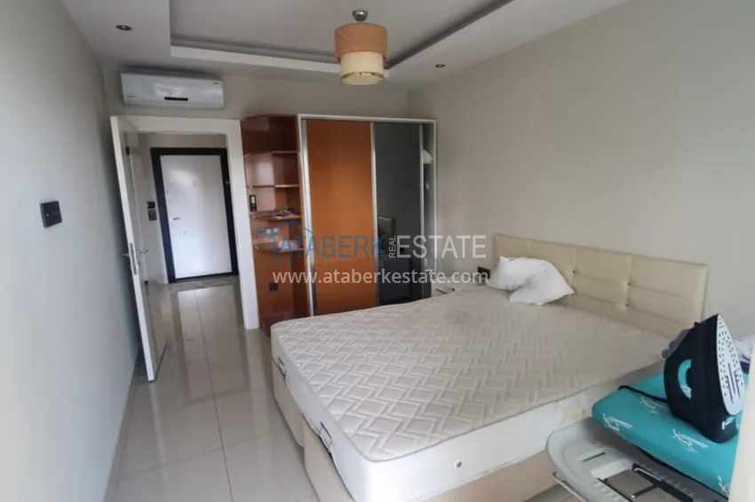 Приобрести Квартира 1+1 с мебелью рядом с морем в районе открытом для ВНЖ, Тосмур  12 