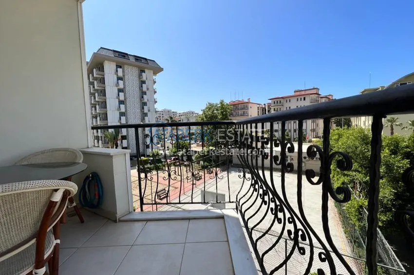 Приобрести Квартира 2+1 с мебелью в уютном комплексе всего в 250 метрах от моря, район Оба – Алания 12 