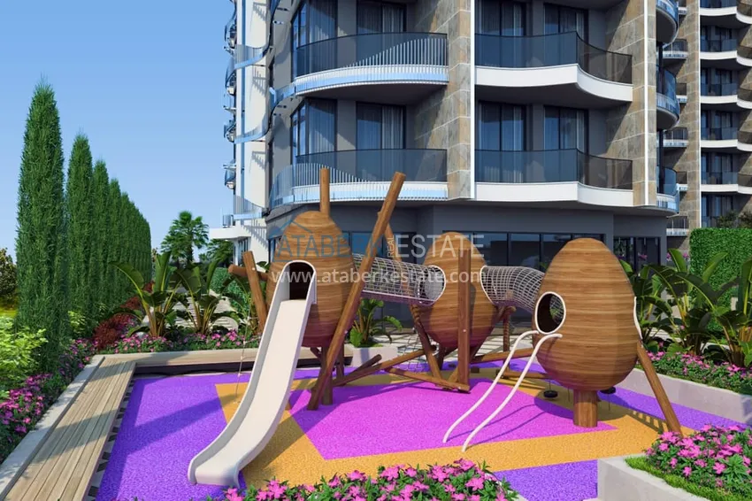 Квартиры 1+1 от инвестора в строящемся комплексе премиум-класса в 120 метрах от моря – Тосмур, Алания 13 