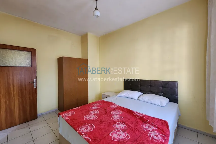 Приобрести Квартира 2+1 частично меблированная, всего в 300 метрах от моря, район Махмутлар – Алания 12 