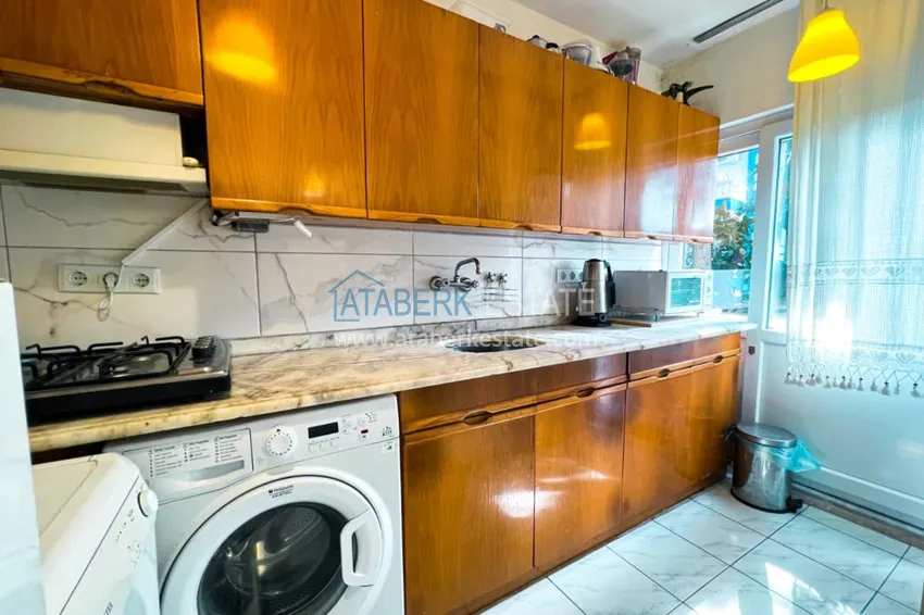 Приобрести Просторная двухкомнатная квартира с мебелью и камином в районе Алании – Конаклы 12 