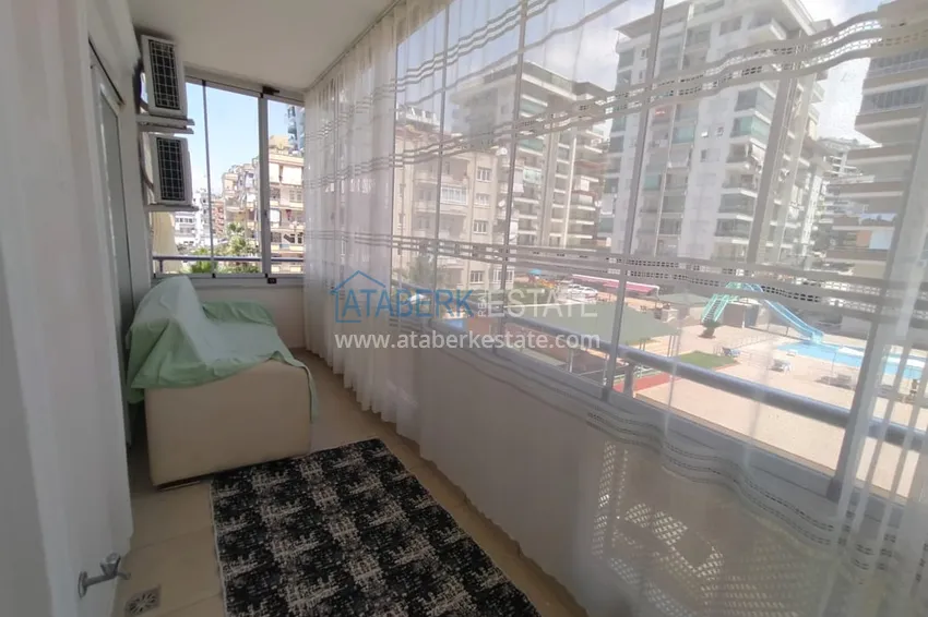 Приобрести Двухкомная квартира в Махмутларе с мебелью в комплексе с бассейном 13 