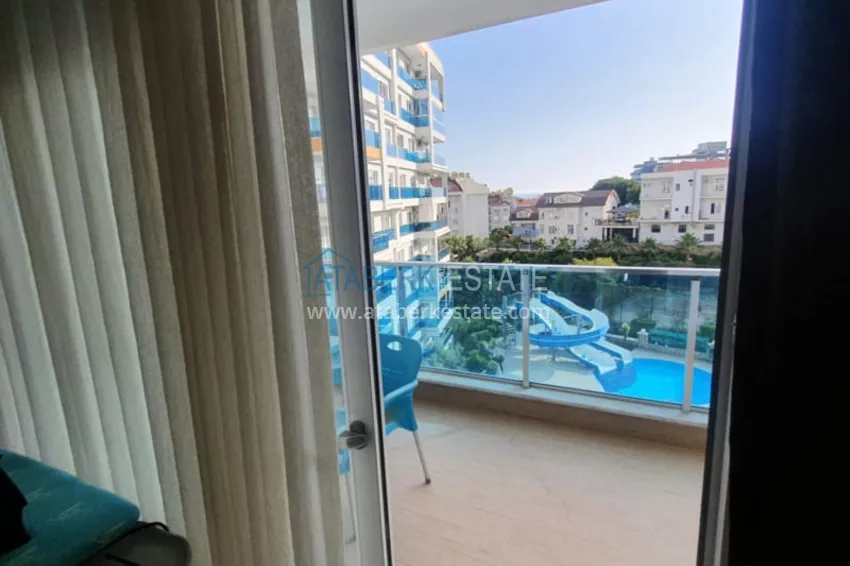 Приобрести Квартира 1+1 с мебелью рядом с морем в районе открытом для ВНЖ, Тосмур  14 