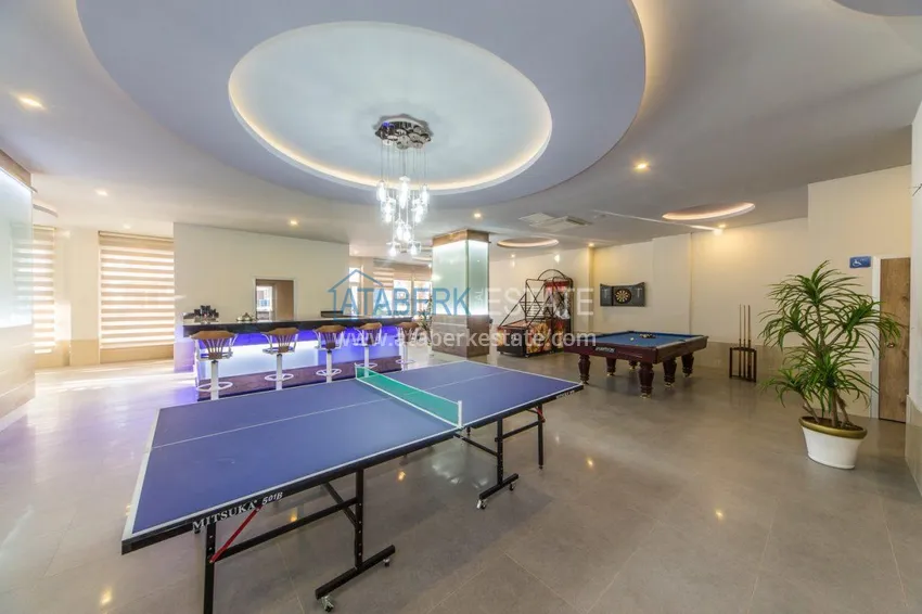 Дуплекс 4+1 с выходом в сад в Кестеле меблированный в элитной резиденции 13 