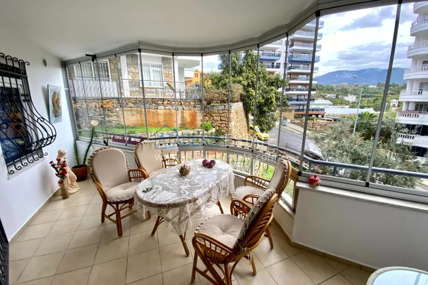 Приобрести Квартира 2+1 меблированная с застеклёнными балконами и видом на горы, район Тосмур – Алания 13 