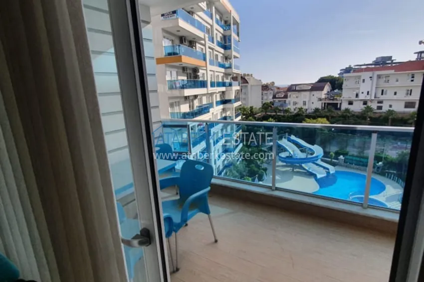 Приобрести Квартира 1+1 с мебелью рядом с морем в районе открытом для ВНЖ, Тосмур  15 