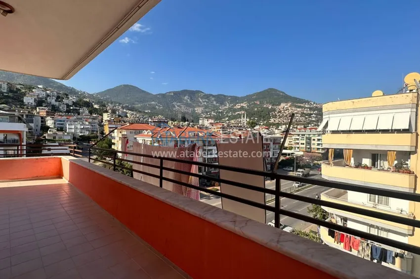 Приобрести Трехкомнатная квартира с открытым видом на горы и море в центре Алании 12 